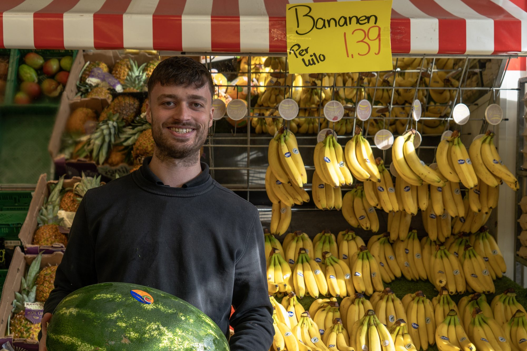 Portret van een medewerker van de Koopman Ede in de winkel